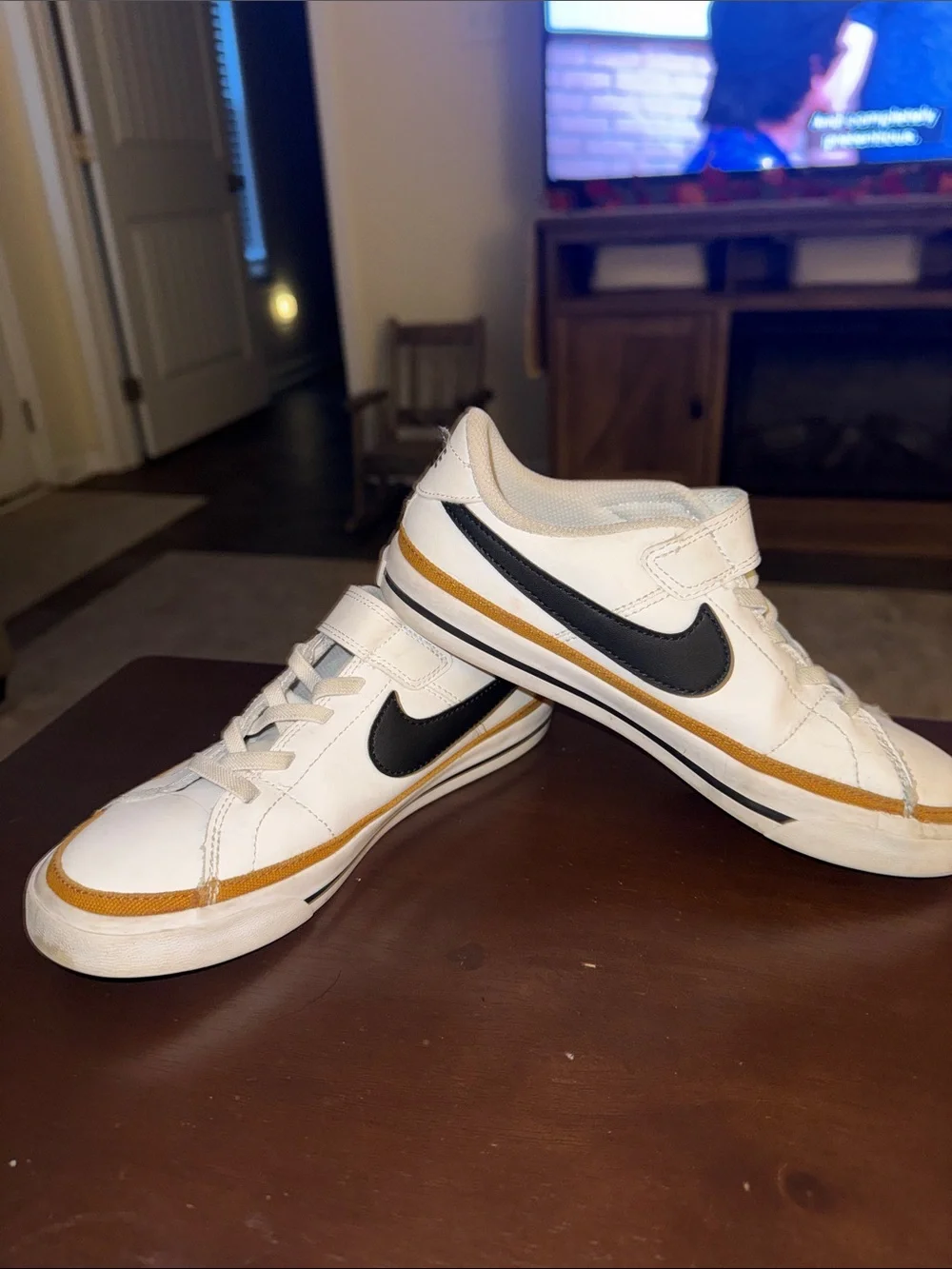 Nike White Sneakers with Black Swoosh and Tan Trim